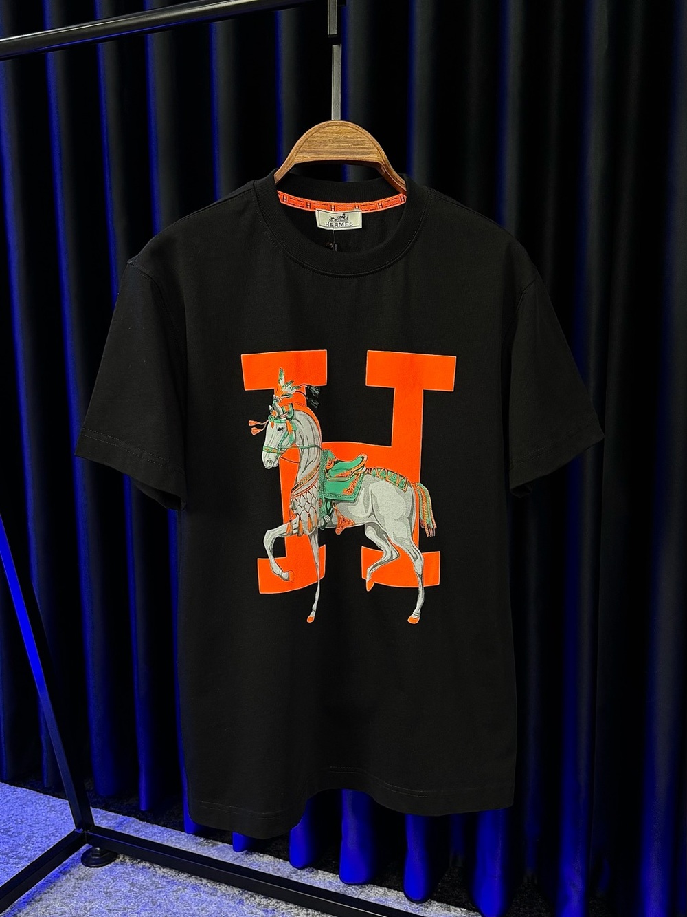 Hermes Black Tee with Bold Orange 'H' and Equestrian Motif